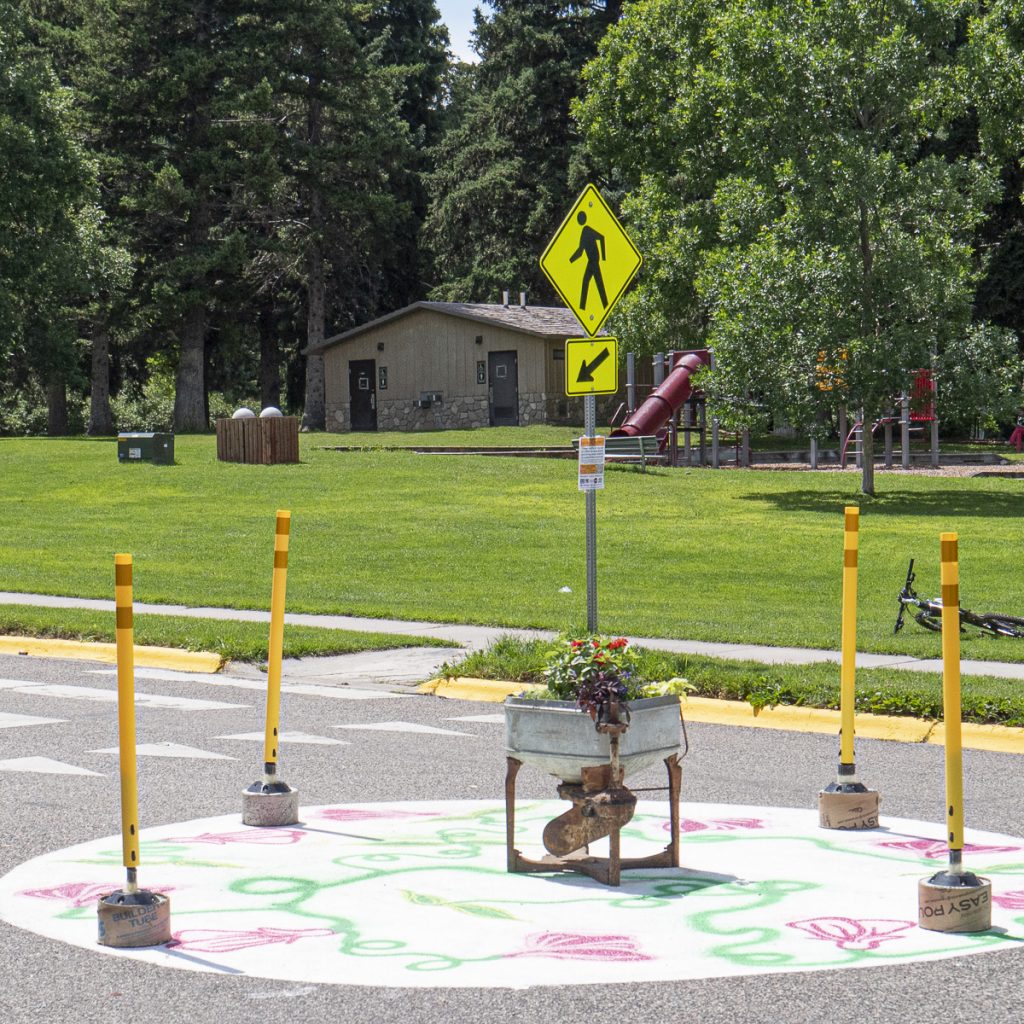 Temporary pop-up roundabout traffic calming installation